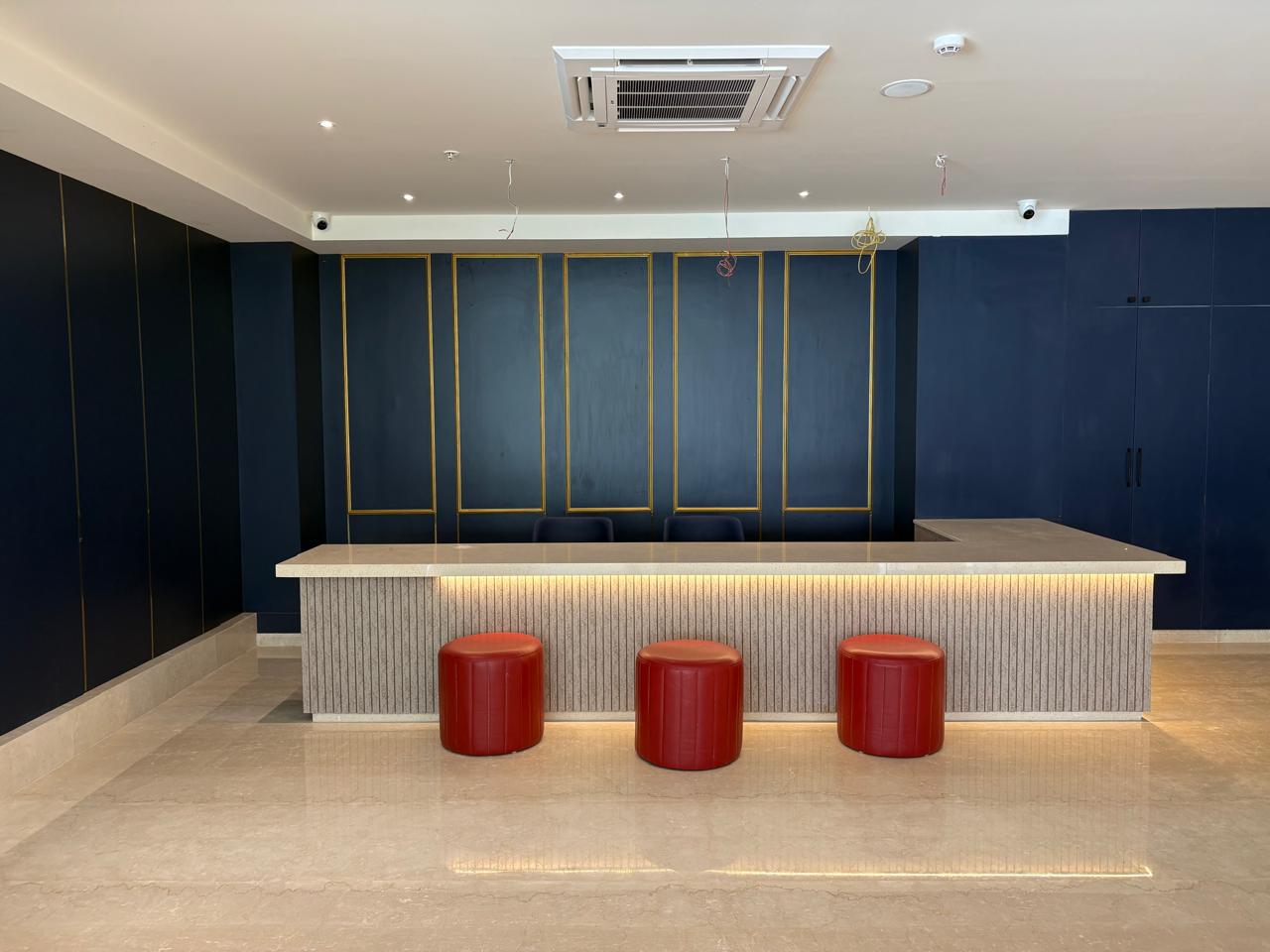 Elegant banquet hall with round tables and chandelier lighting