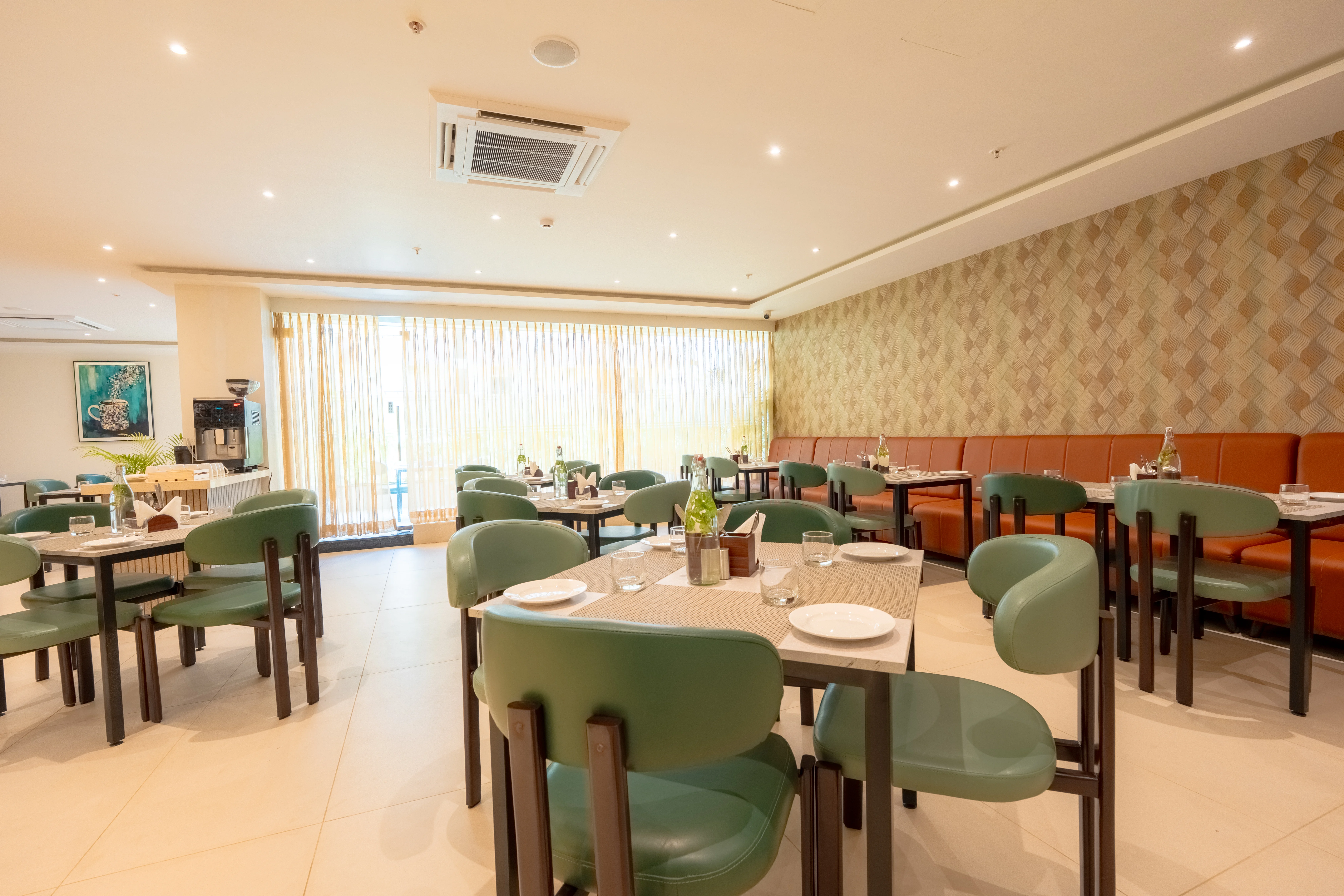 Elegant banquet hall with round tables and chandelier lighting